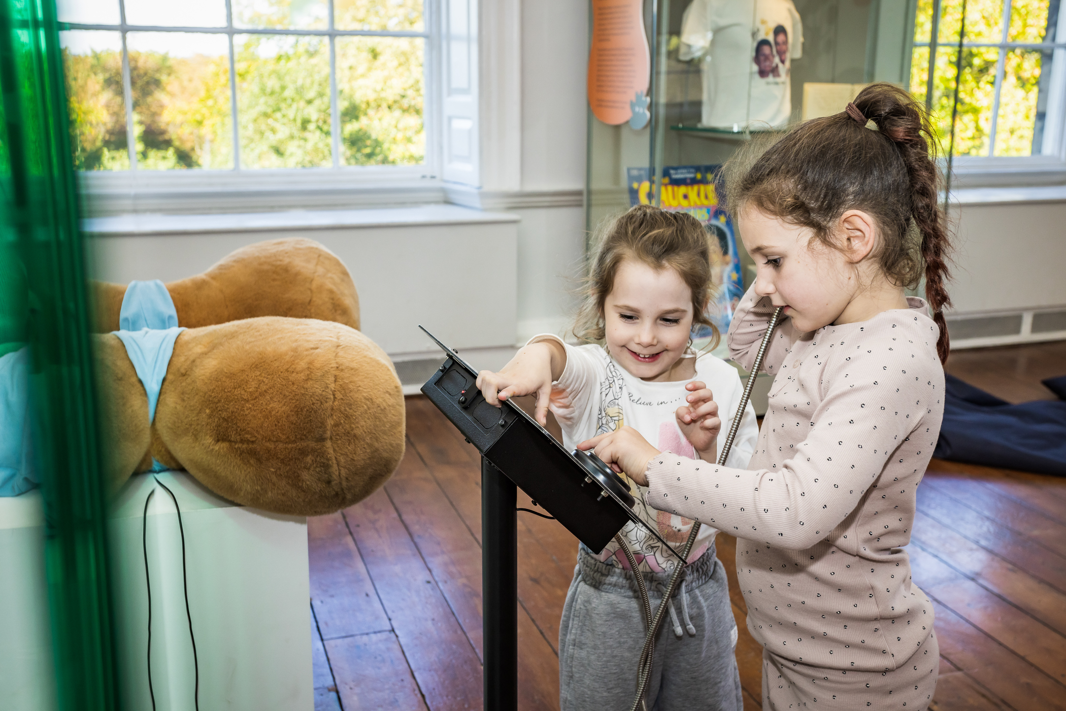 children using museum exhibition devices