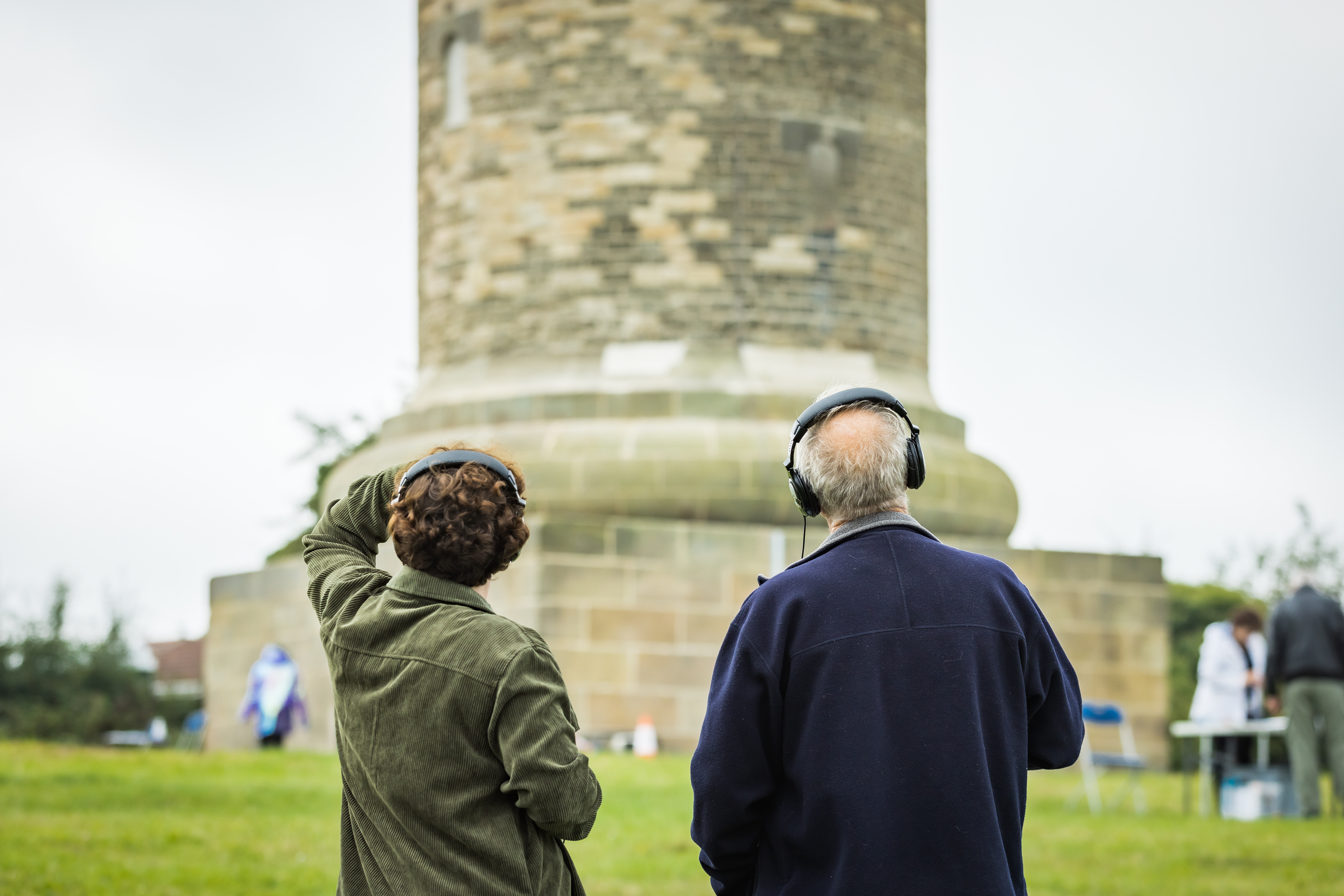 two people standing in front of Keppels column