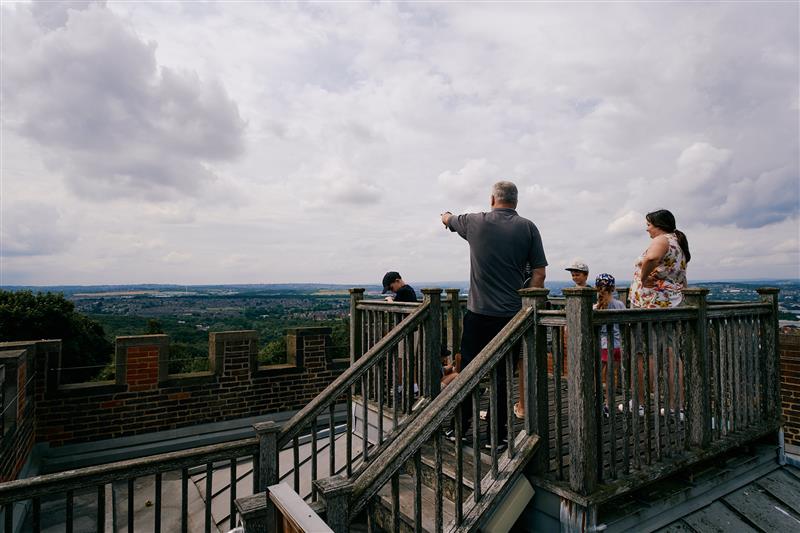 Male and female stood at the top of the roof tour