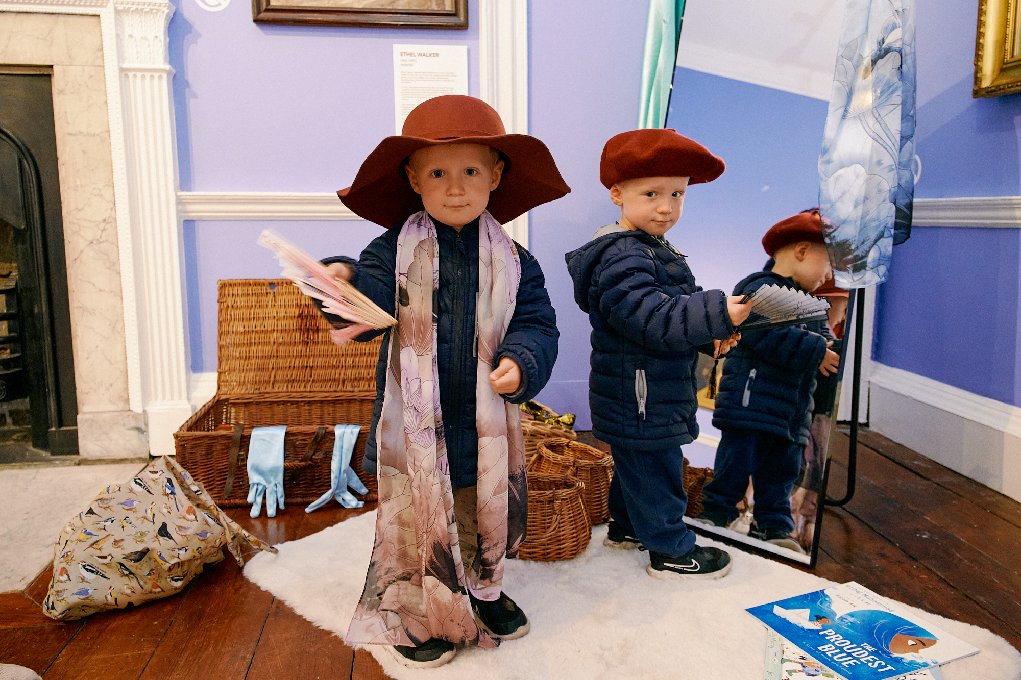 Young children in the self made women room dressing up