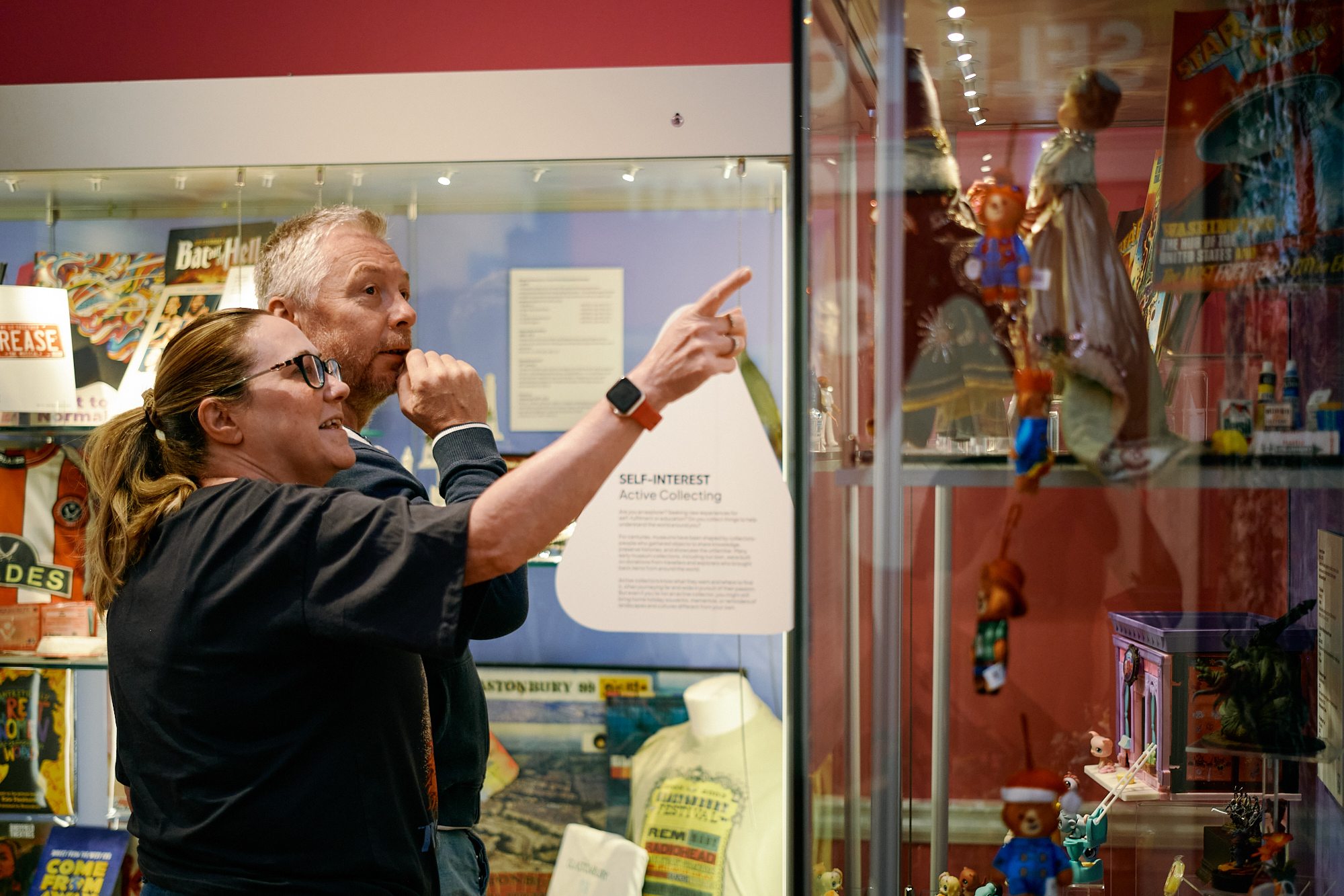 Male and female visitor stood looking at SELF interest room